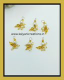 Golden moti hair jhumki